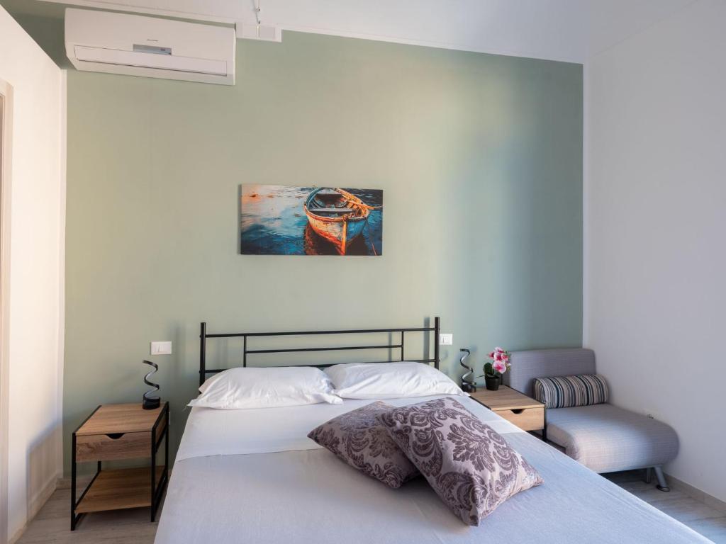 Postel nebo postele na pokoji v ubytování Agorà di Favignana
