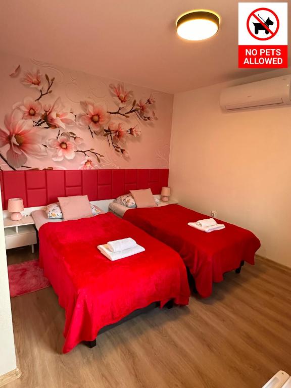 Postel nebo postele na pokoji v ubytování Le Rose Suites & Park Hotel