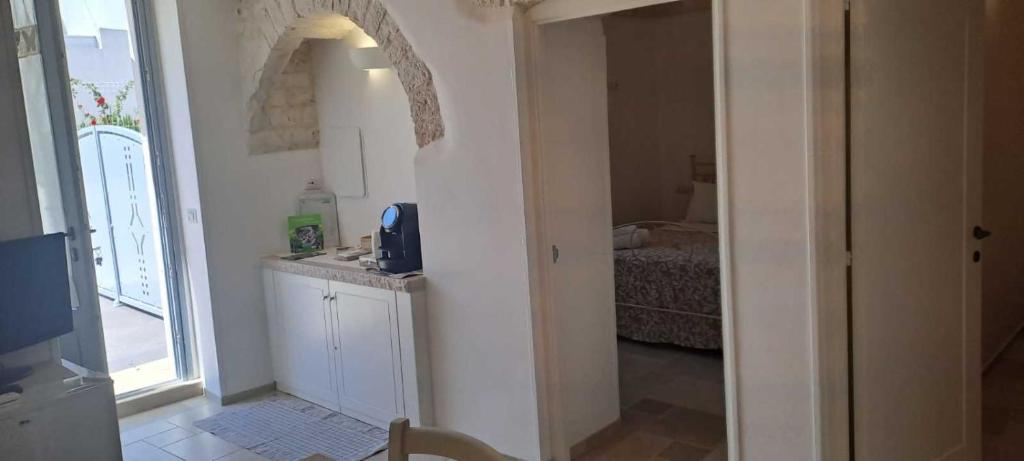 A television and/or entertainment centre at Trulli Live Alberobello