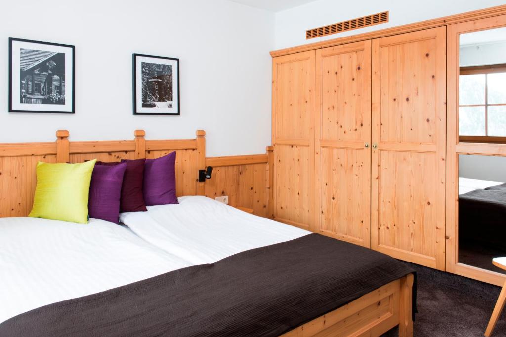 Postel nebo postele na pokoji v ubytování Hotel Goldried