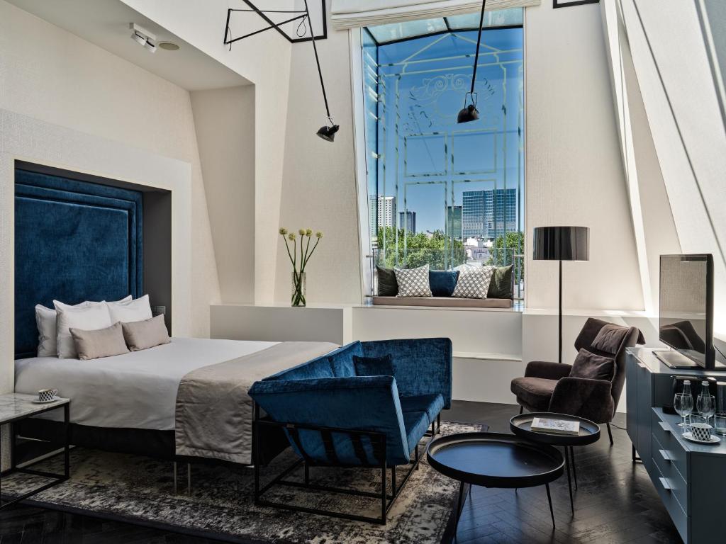 Posteľ alebo postele v izbe v ubytovaní Hotel Indigo Warsaw Nowy Świat by IHG