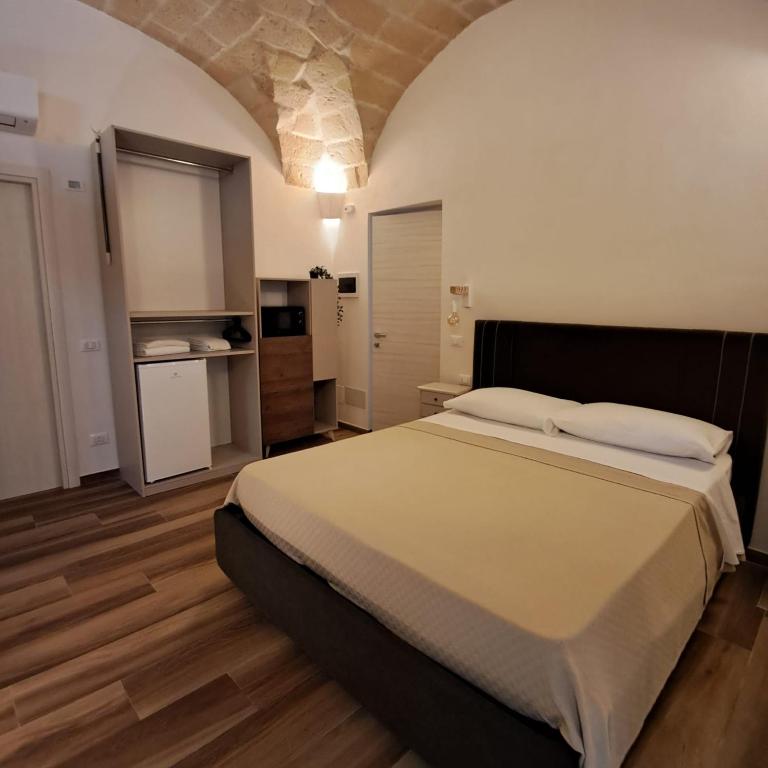 Postel nebo postele na pokoji v ubytování La dimora del vento
