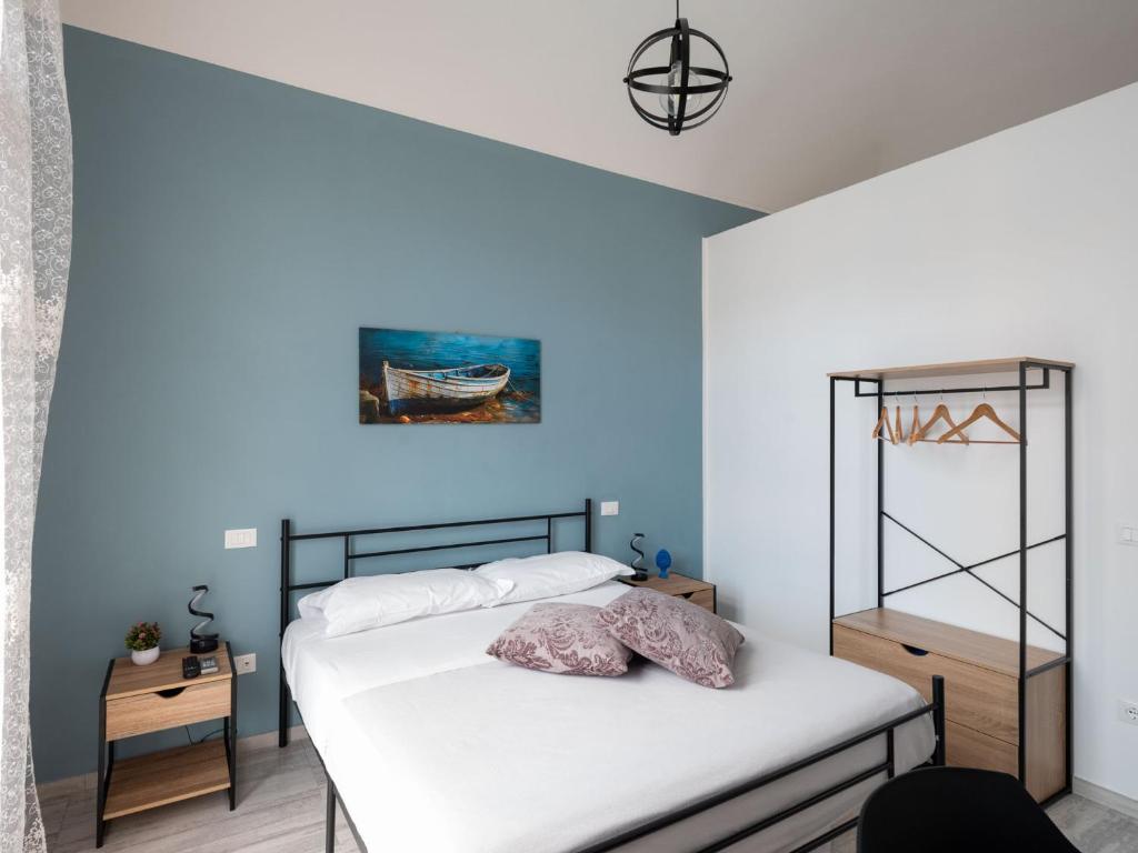 Postel nebo postele na pokoji v ubytování Agorà di Favignana