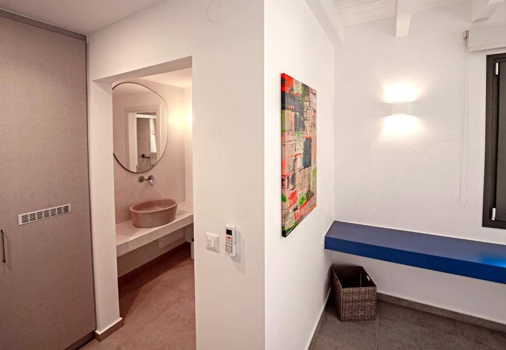 Łóżko lub łóżka w pokoju w obiekcie FarOut - BeachResort & Camping
