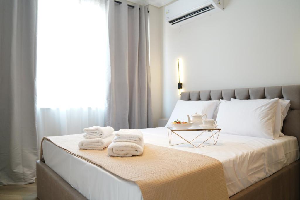Ένα ή περισσότερα κρεβάτια σε δωμάτιο στο MoNTaN Suite Apartment