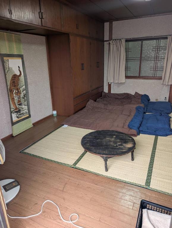 Postel nebo postele na pokoji v ubytování Shared room second
