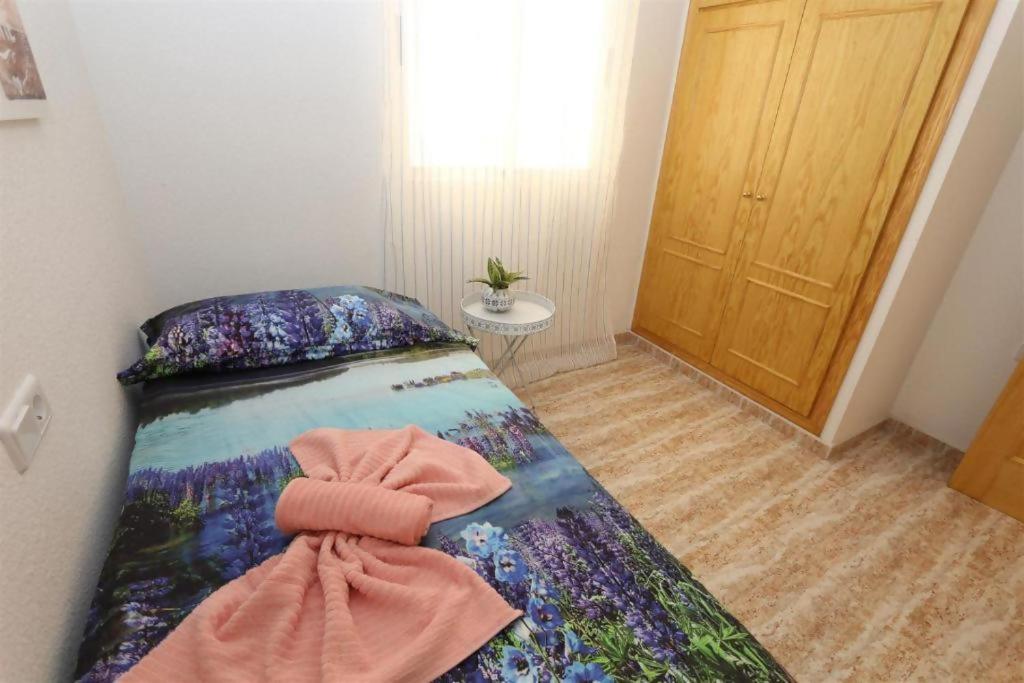 Postel nebo postele na pokoji v ubytování R-5080 La Mata Apartment