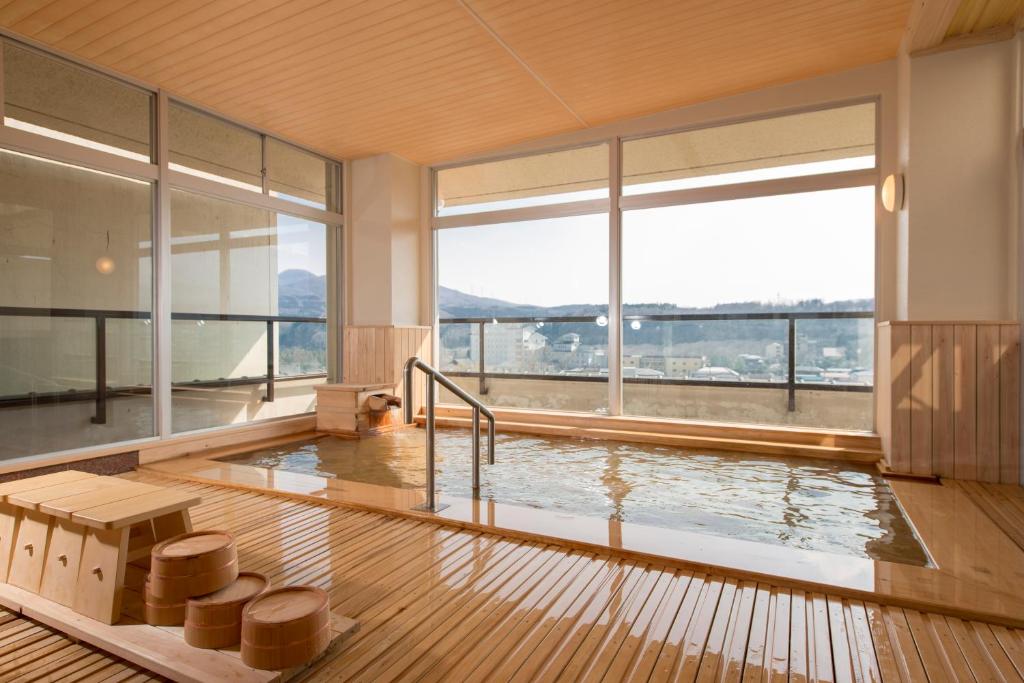 Bazén v ubytování かっぱの宿旅館三治郎 nebo v jeho okolí