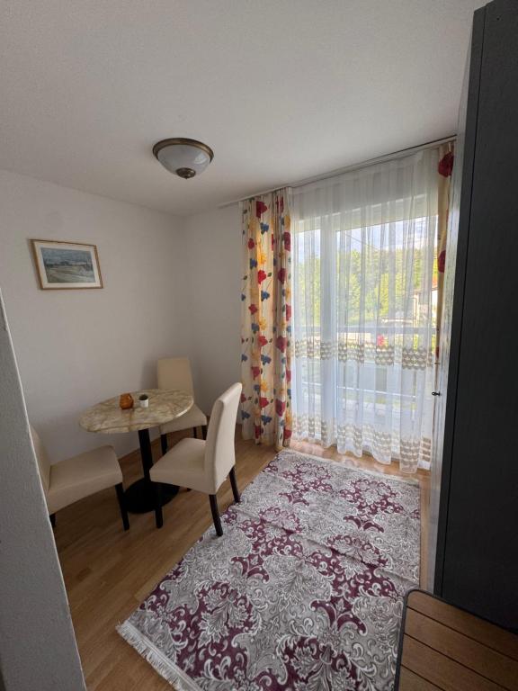 Postel nebo postele na pokoji v ubytování Guesthouse-Mother