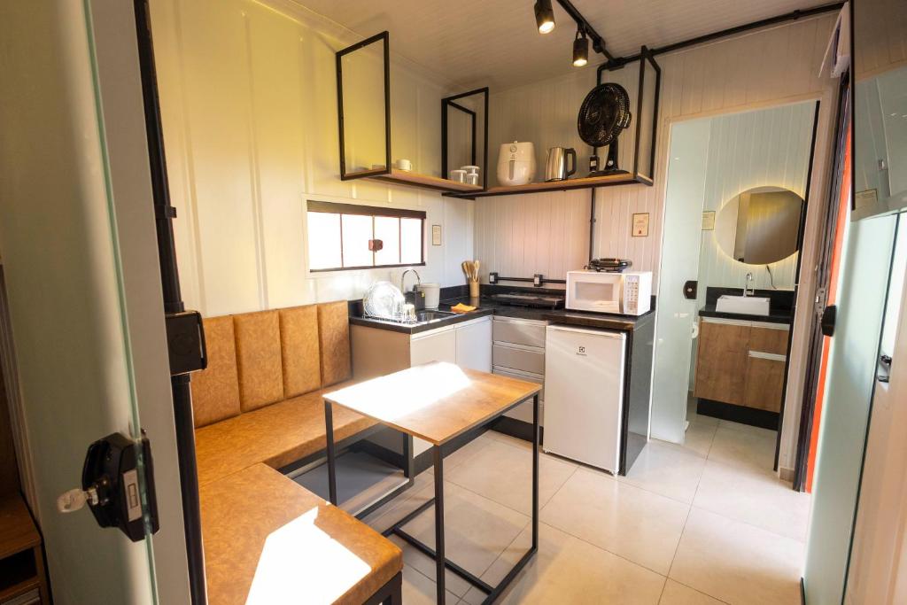 Kuchyň nebo kuchyňský kout v ubytování Studio 9 completo confortável no Ahú 1º andar