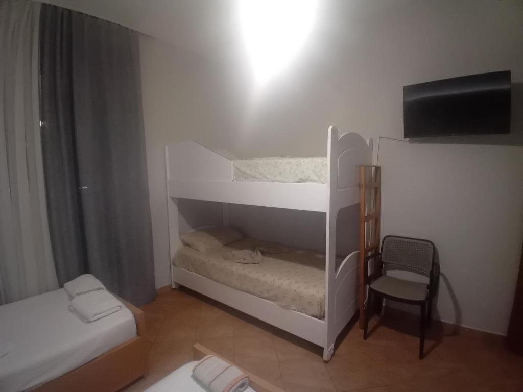 Postel nebo postele na pokoji v ubytování Zina Rooms 1 minute away from the beach
