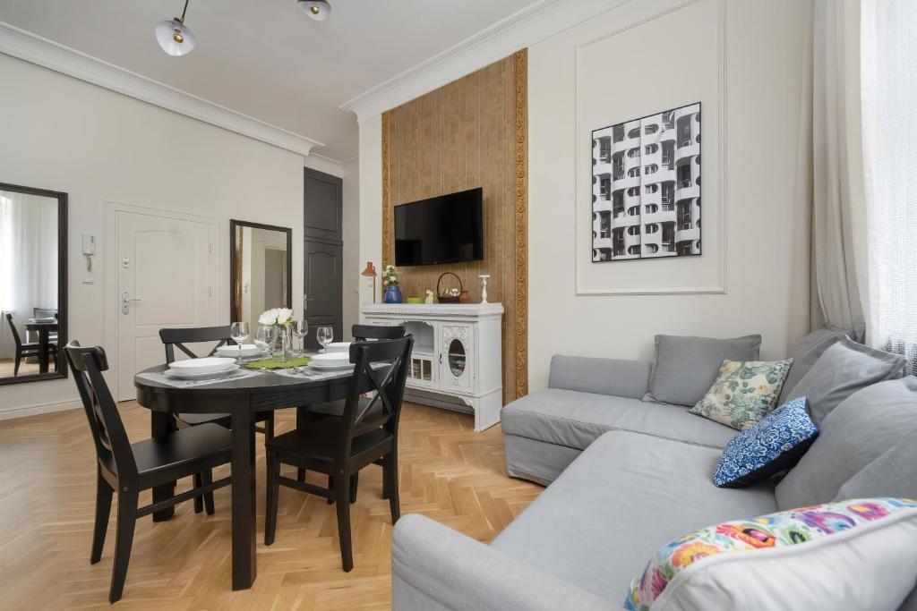 Posedenie v ubytovaní Exclusive Old Town Apartment by Noclegi Renters