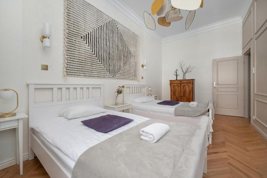 Posteľ alebo postele v izbe v ubytovaní Exclusive Old Town Apartment by Noclegi Renters