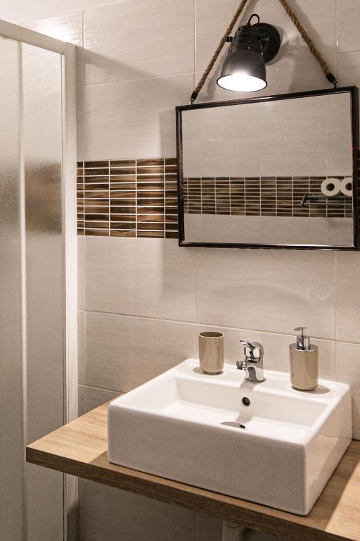 Koupelna v ubytování InGarda Rooms