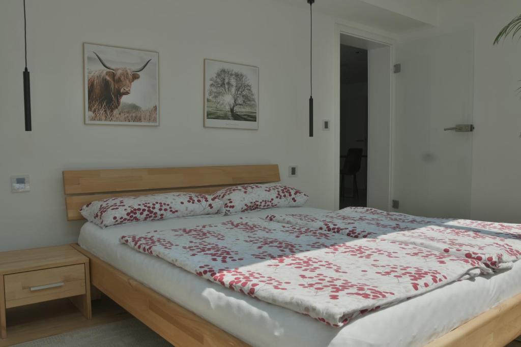 Postel nebo postele na pokoji v ubytování DonauDeluxe