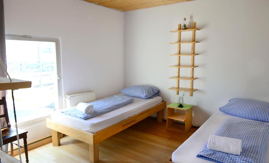 Postel nebo postele na pokoji v ubytování Hostel Westküste