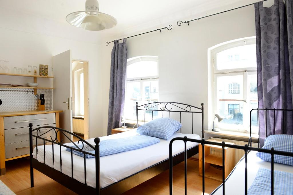 Postel nebo postele na pokoji v ubytování Hostel Westküste