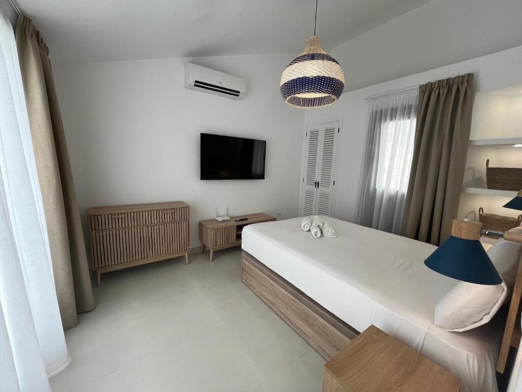 Postel nebo postele na pokoji v ubytování Estepona - Playa - Villa situada muy cerca del mar