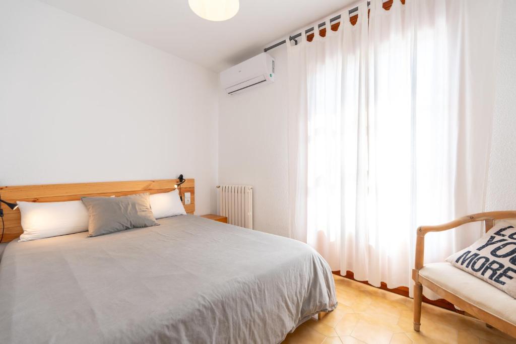 Postel nebo postele na pokoji v ubytování Allotjament lo Ribé