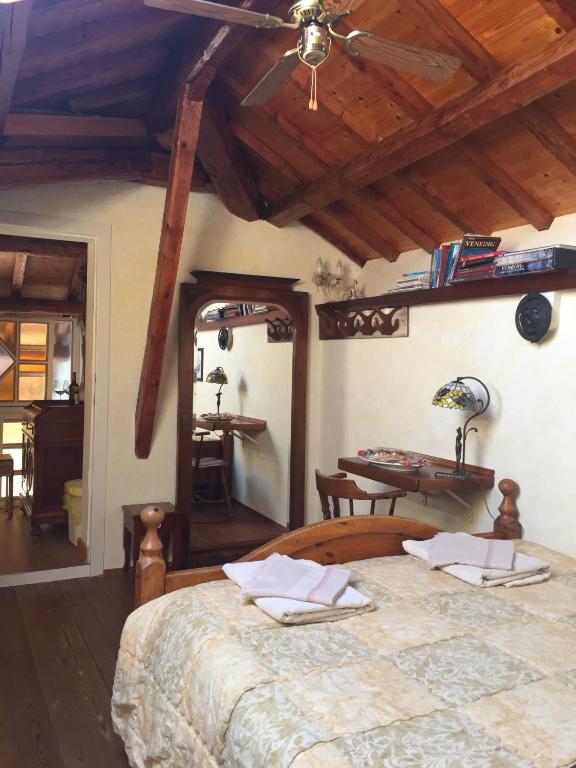 Postel nebo postele na pokoji v ubytování B&B Tra Mare e Laguna