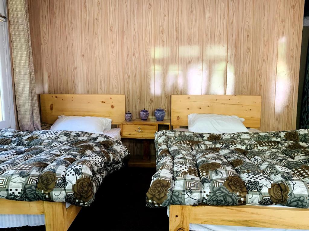Postel nebo postele na pokoji v ubytování The Indus Escape