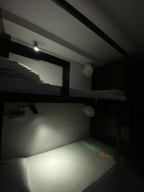 Ένα ή περισσότερα κρεβάτια σε δωμάτιο στο New Frezon hostel