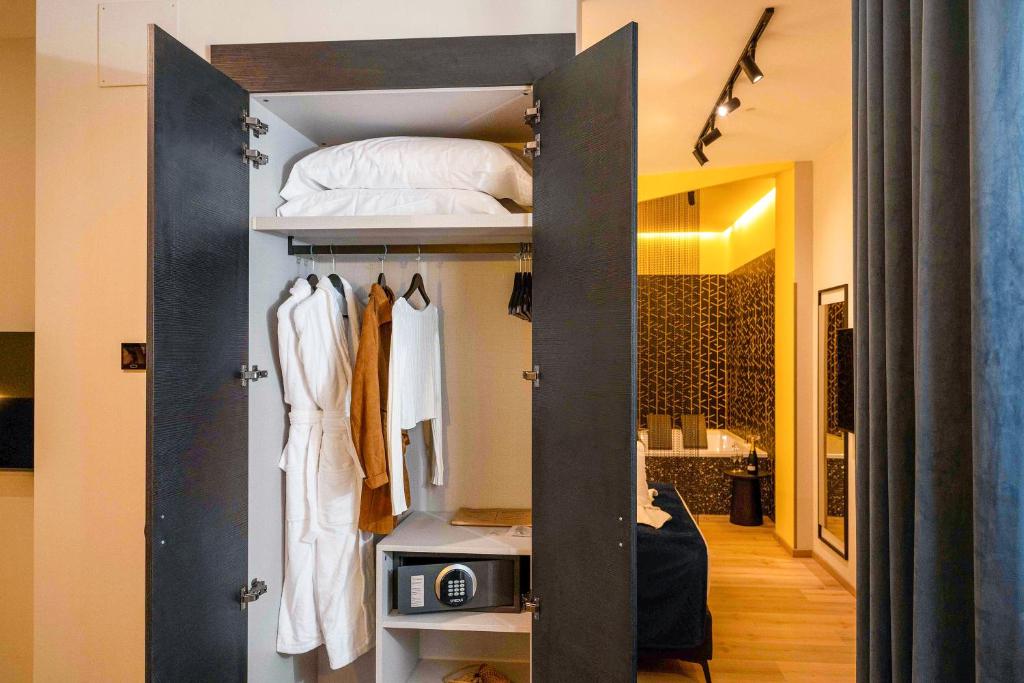 Postel nebo postele na pokoji v ubytování Hotel Pathos by Mimood Aparthotels