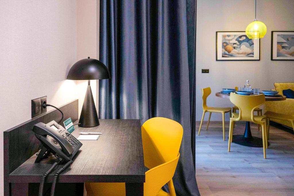 Posezení v ubytování Hotel Pathos by Mimood Aparthotels