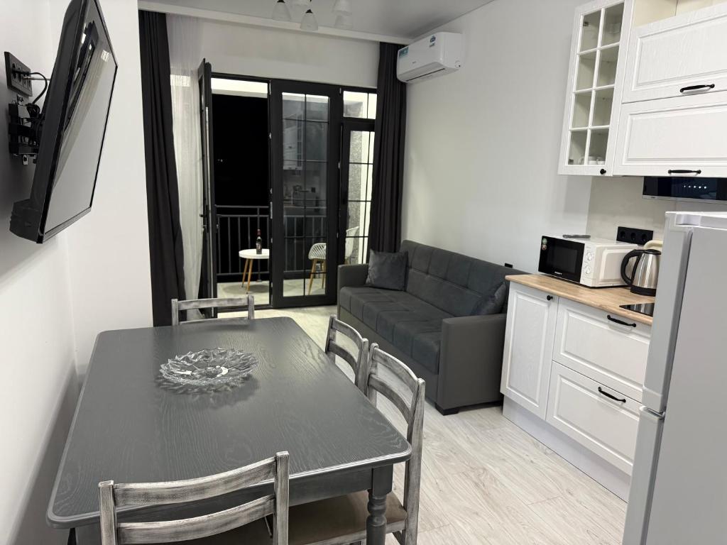 Kuchyň nebo kuchyňský kout v ubytování Memory Apart Hotel