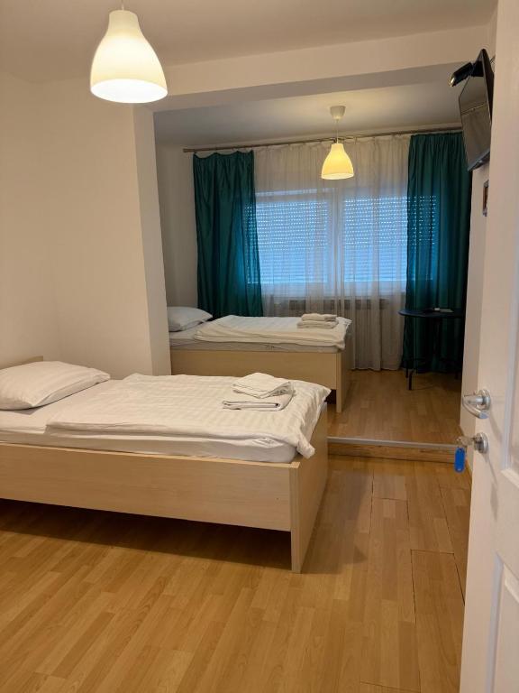 Posteľ alebo postele v izbe v ubytovaní Rooms Stella