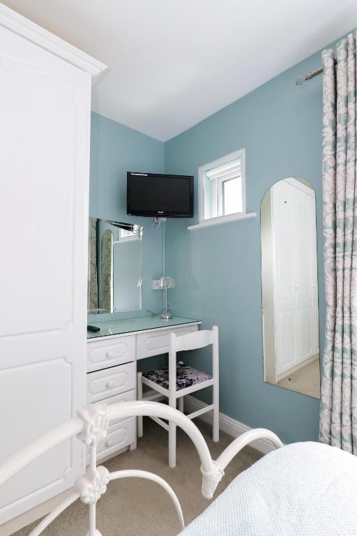 TV a/nebo společenská místnost v ubytování Sea Mist Guesthouse