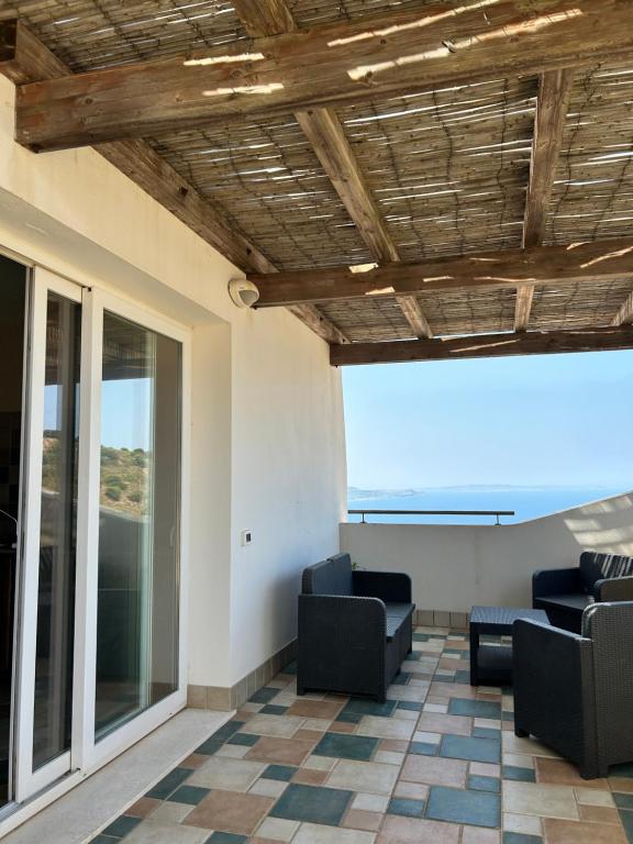 Khu vực ghế ngồi tại Attico Le Vele con vista mare - Nebida
