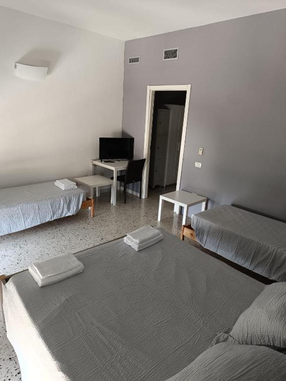 Voodi või voodid majutusasutuse Glemerald Hostel toas