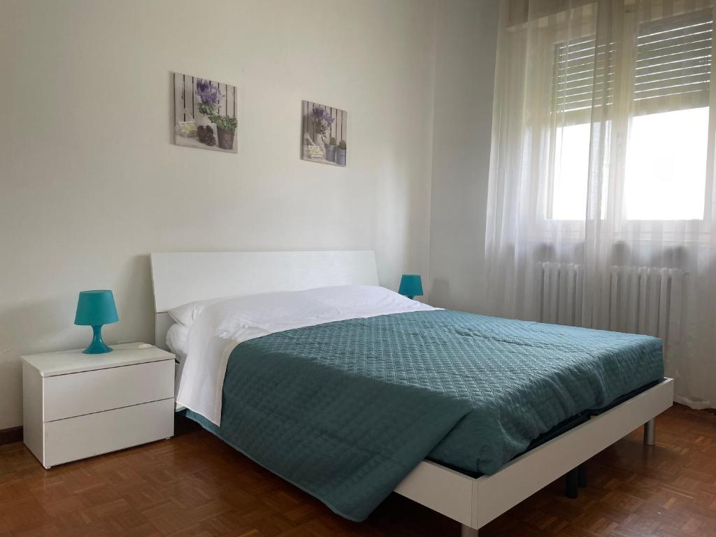 Postel nebo postele na pokoji v ubytování La Casa Nel Verde