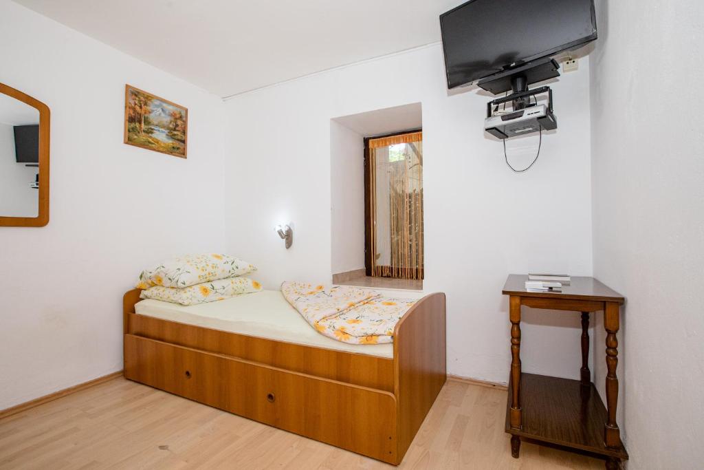 Postel nebo postele na pokoji v ubytování Apartments Jug