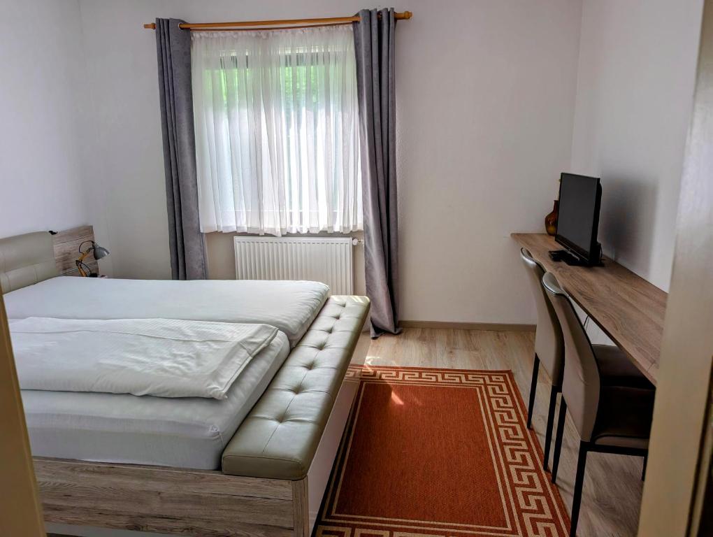 Postel nebo postele na pokoji v ubytování Pension Hofer