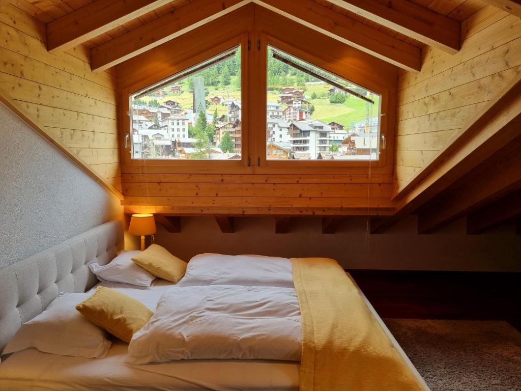 Postel nebo postele na pokoji v ubytování Penthouse Apartment Perla