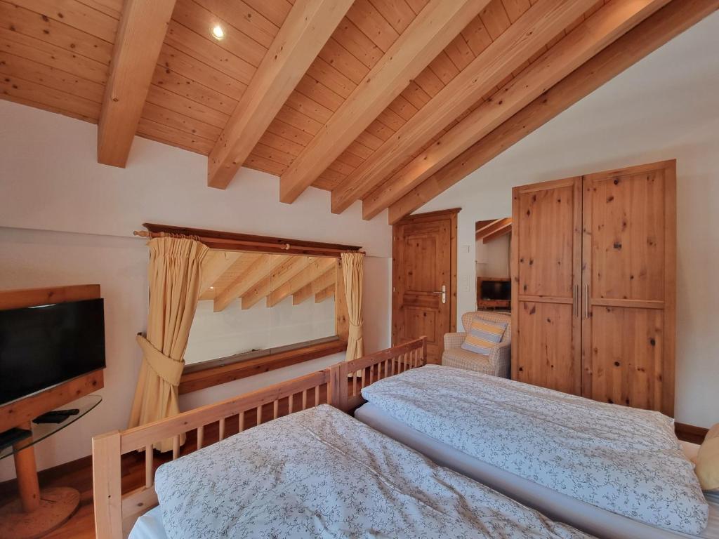Postel nebo postele na pokoji v ubytování Penthouse Apartment Perla