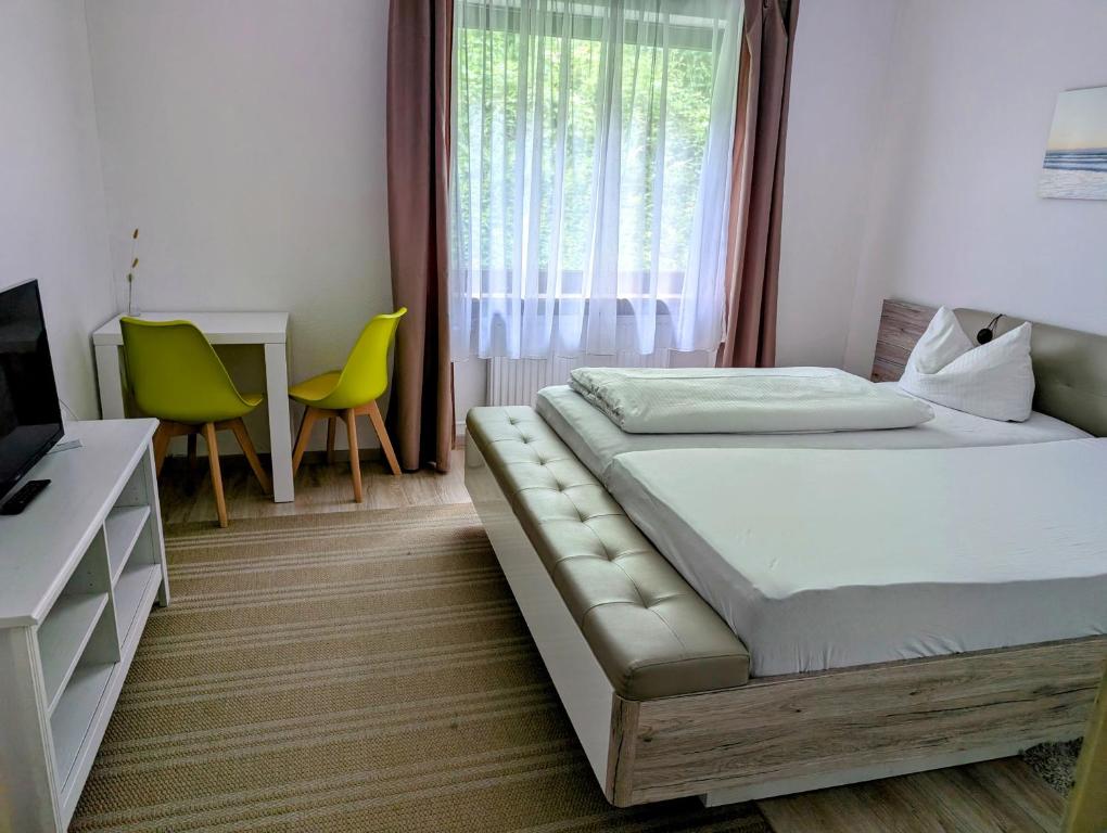 Postel nebo postele na pokoji v ubytování Pension Hofer