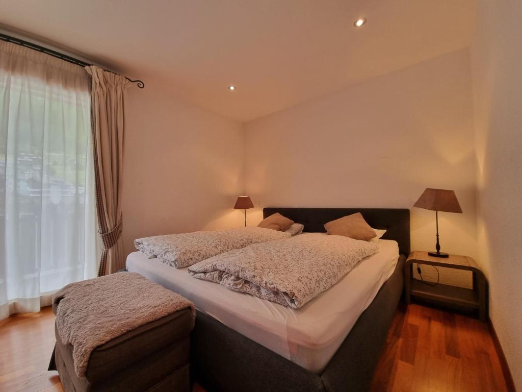 Postel nebo postele na pokoji v ubytování Penthouse Apartment Perla
