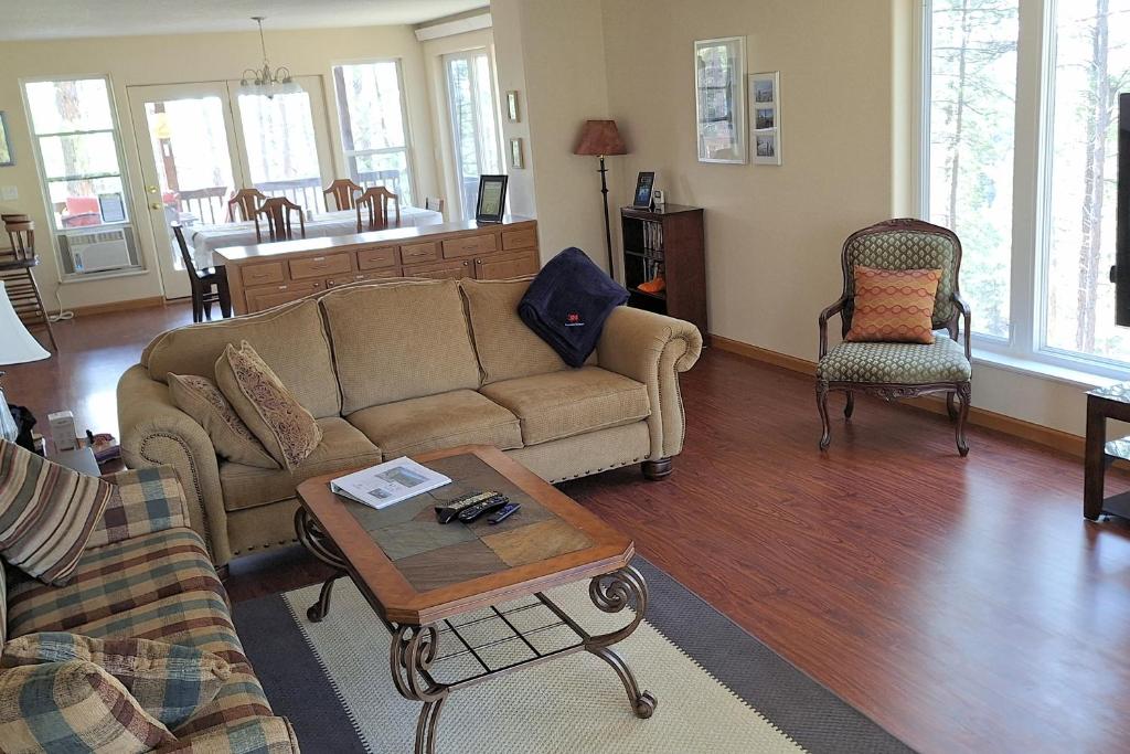 a living room with a couch and a coffee table at Boxelder Bluff in Rapid City