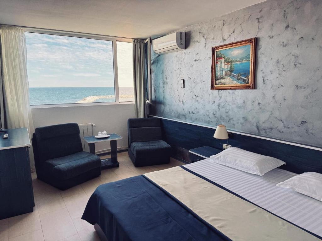 Postel nebo postele na pokoji v ubytování Hotel Venus