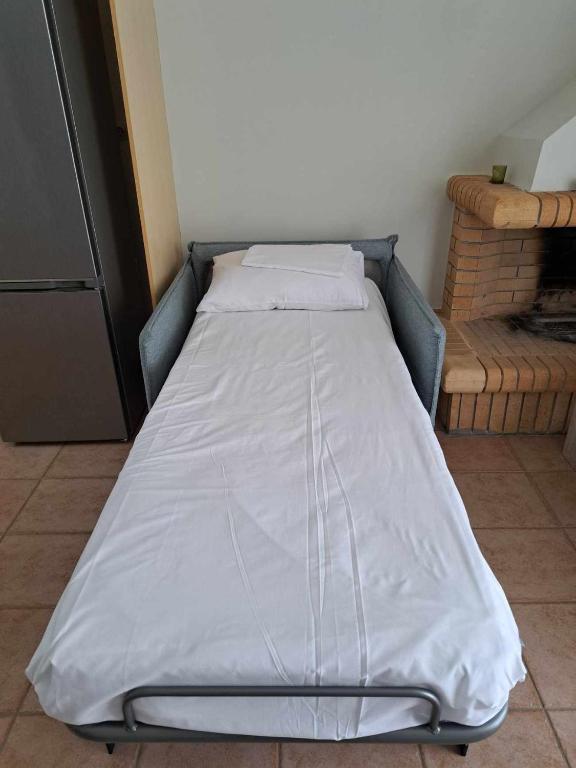 Postel nebo postele na pokoji v ubytování Paralio Place