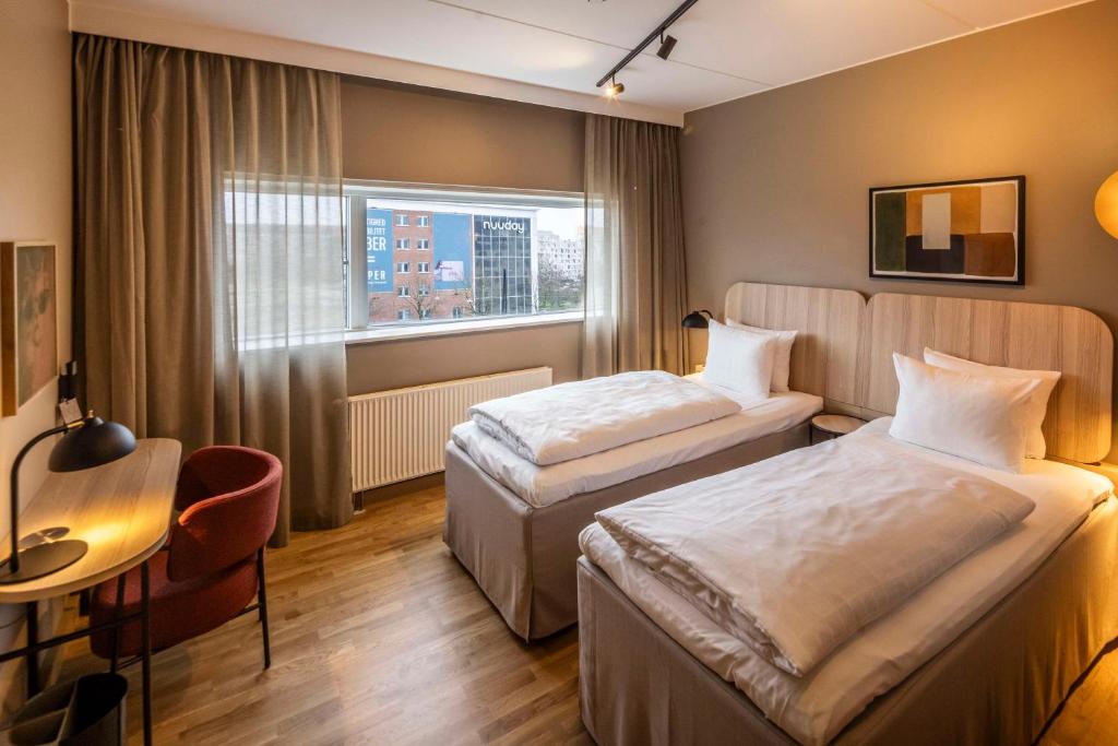 Postel nebo postele na pokoji v ubytování Scandic Sydhavnen