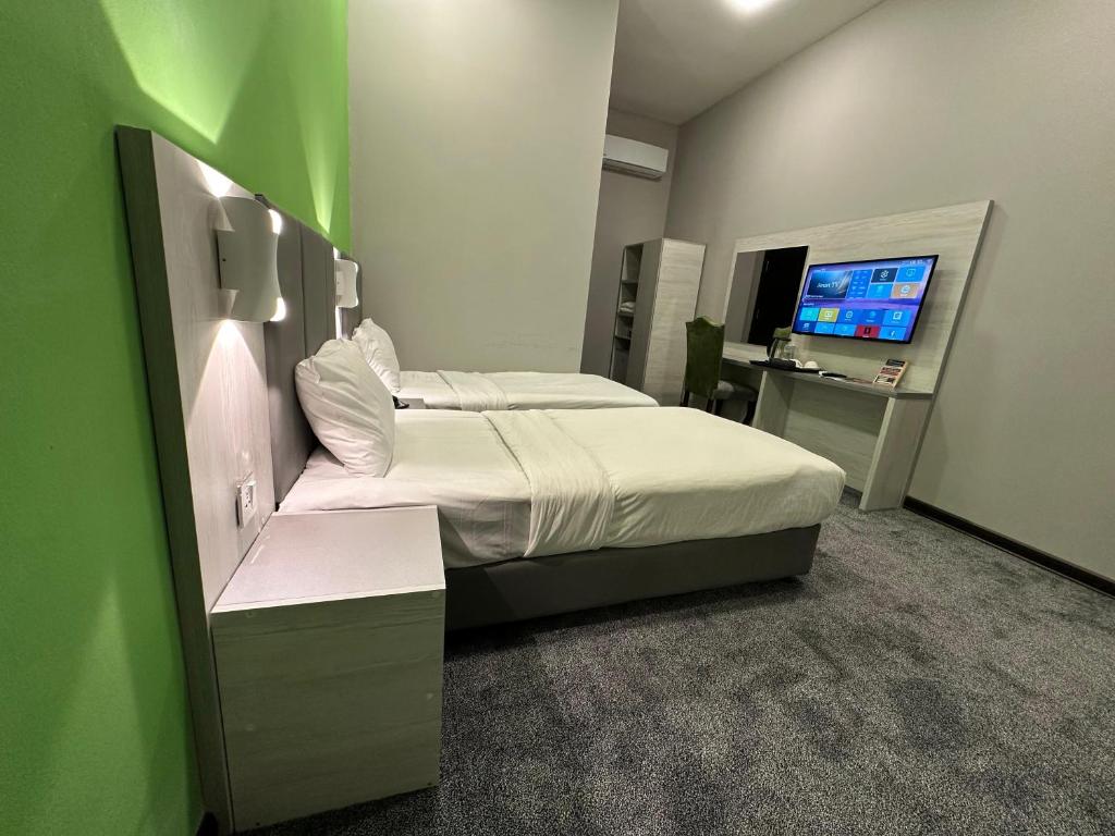 Postel nebo postele na pokoji v ubytování Istanbul Gold Hotel Baku