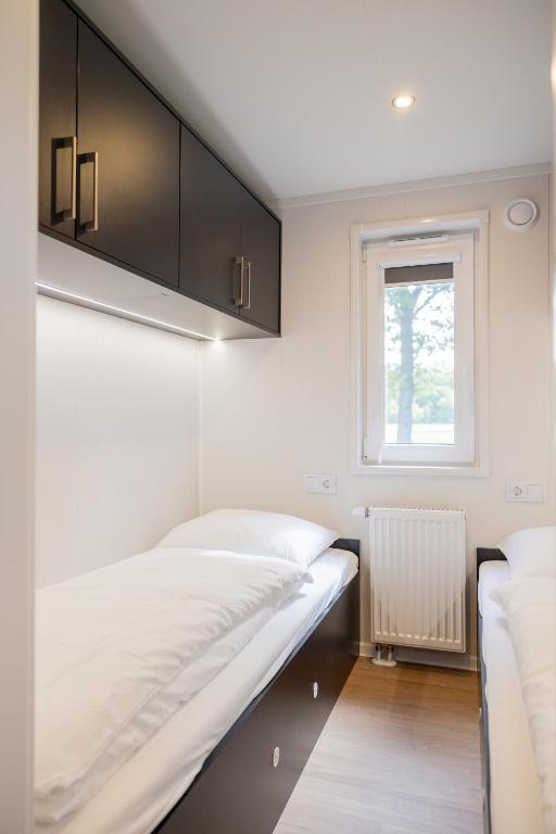 Postel nebo postele na pokoji v ubytování Chalet Chique