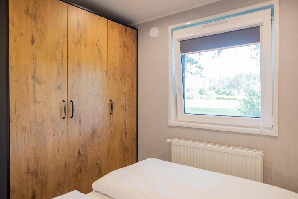 Postel nebo postele na pokoji v ubytování Chalet Rustique