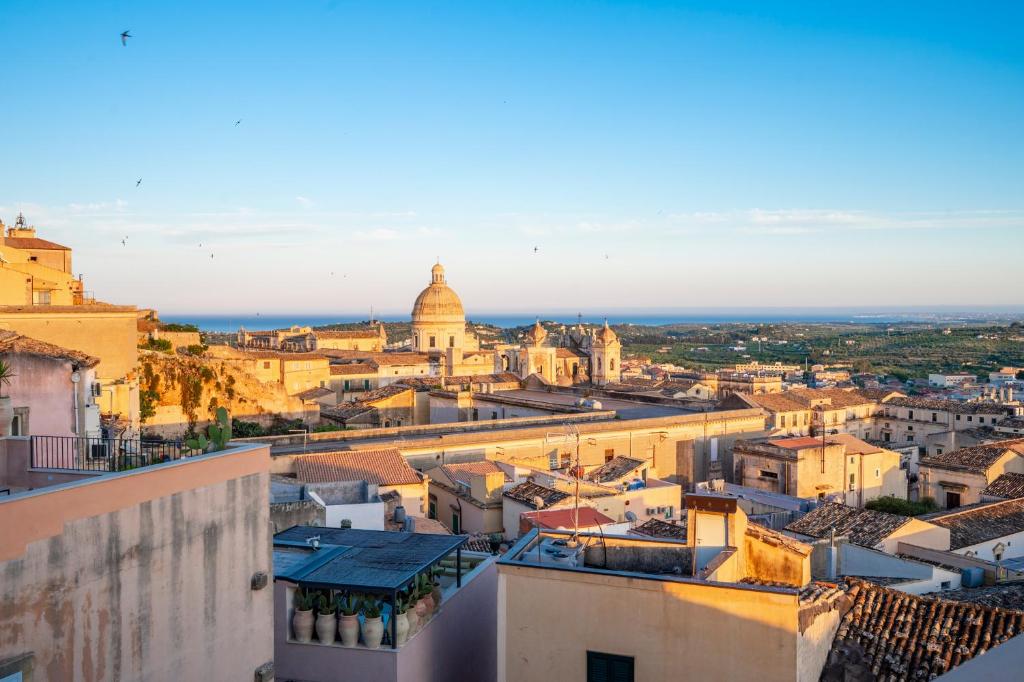 a view of a city from the roof of a building at Panorama Suites Noto - Adults Only in Noto