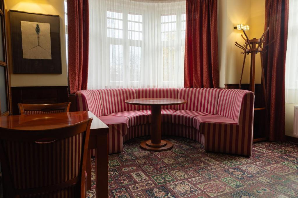 Posezení v ubytování Hotel Villa