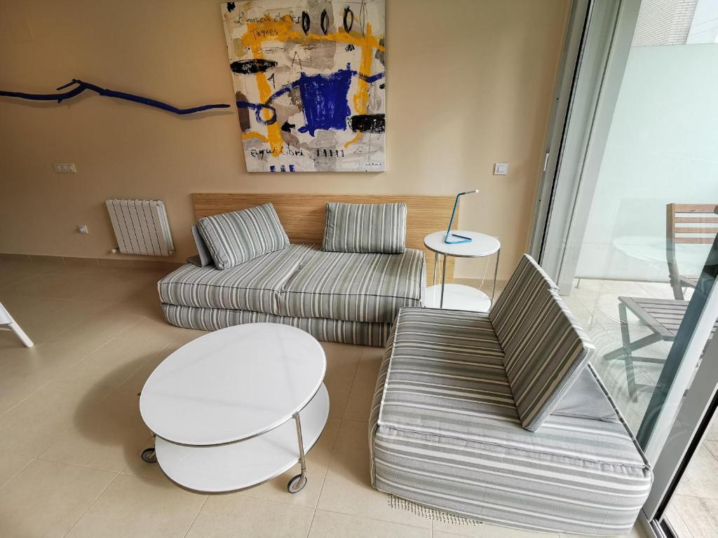 Posedenie v ubytovaní Apartamento ideal en Llançà: Terraza, parking y cerca de la playa - ES-89-87